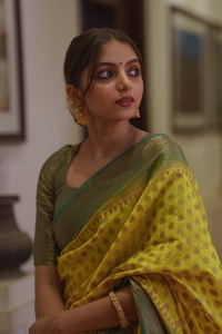 Lemon Yellow Banarasi Soft Silk Saree with Polka Buttis and Contrast Dark Brocade Border  in Surat