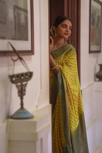 Lemon Yellow Banarasi Soft Silk Saree with Polka Buttis and Contrast Dark Brocade Border  in Surat
