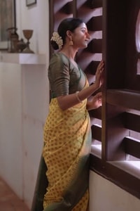 Lemon Yellow Banarasi Soft Silk Saree with Polka Buttis and Contrast Dark Brocade Border  in Surat video 1
