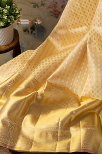 Lemon Yellow Banarasi Soft Silk Saree with Silver Zari Butis and Woven Pallu  in Surat