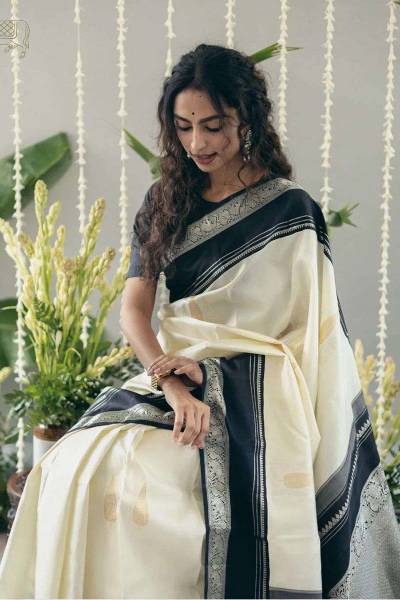 Luxurious Soft Off White Banarasi Saree with Intricate Golden Zari Flowers Desing Saree in Surat