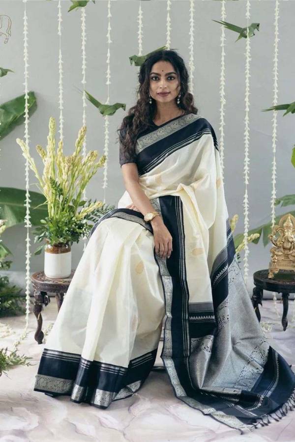 Luxurious Soft Off White Banarasi Saree with Intricate Golden Zari Flowers Desing Saree  in Surat