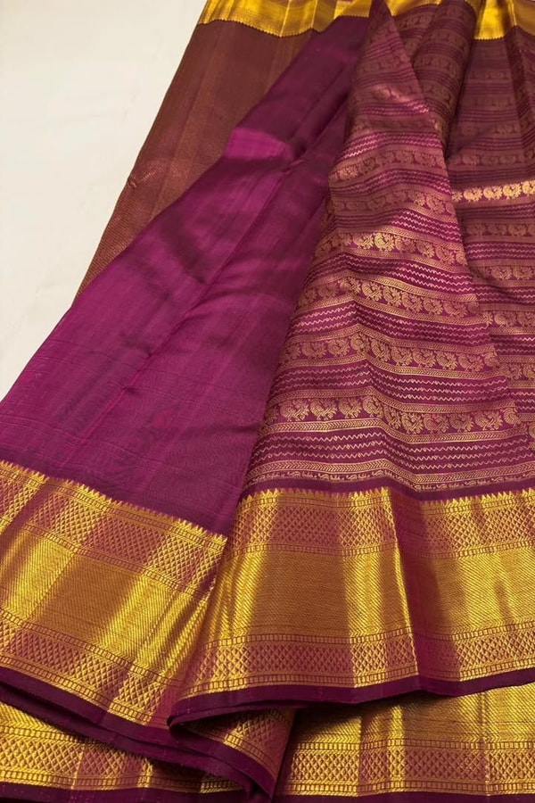 Magenta Banarasi Soft Silk Saree with Horizontal Gold Zari Motif Bands and Heavy Border  in Surat