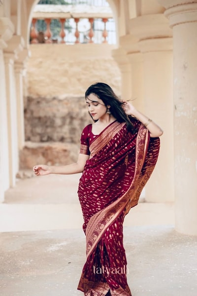 Maroon Banarasi Soft Silk Saree with Dense All-Over Gold Zari Motifs and Zari Border in Surat