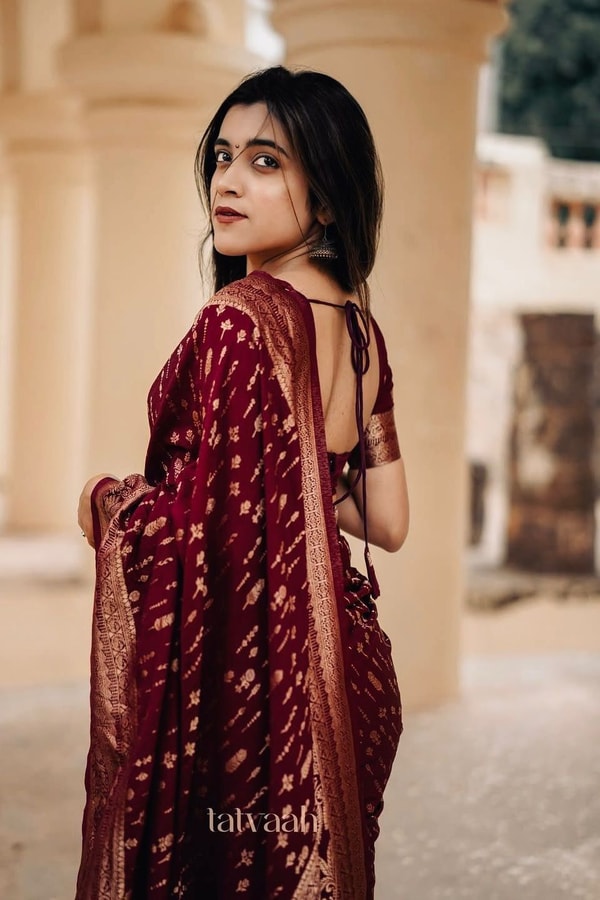 Maroon Banarasi Soft Silk Saree with Dense All-Over Gold Zari Motifs and Zari Border  in Surat