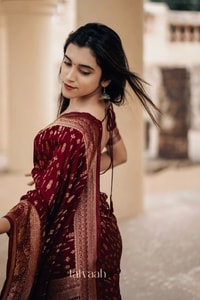 Maroon Banarasi Soft Silk Saree with Dense All-Over Gold Zari Motifs and Zari Border  in Surat