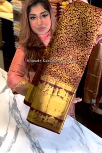 Maroon Banarasi Soft Silk Saree with Dense Gold Zari Body and Figurative Temple Pallu  in Surat