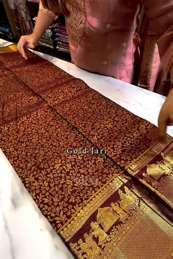 Maroon Banarasi Soft Silk Saree with Dense Gold Zari Body and Figurative Temple Pallu  in Surat