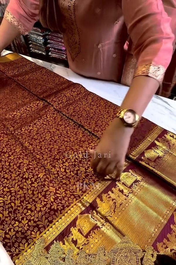 Maroon Banarasi Soft Silk Saree with Dense Gold Zari Body and Figurative Temple Pallu  in Surat