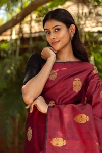 Maroon Banarasi Soft Silk Saree with Gold Zari Buttas and Black Contrast Border  in Surat