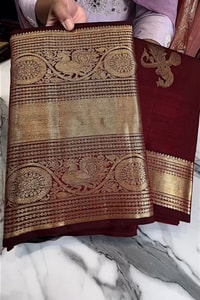 Maroon Banarasi Soft Silk Saree with Gold Zari Buttas and Wide Brocade Border  in Surat