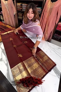 Maroon Banarasi Soft Silk Saree with Gold Zari Buttas and Wide Brocade Border  in Surat
