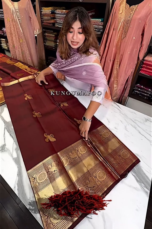 Maroon Banarasi Soft Silk Saree with Gold Zari Buttas and Wide Brocade Border  in Surat