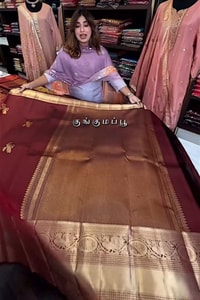 Maroon Banarasi Soft Silk Saree with Gold Zari Buttas and Wide Brocade Border  in Surat