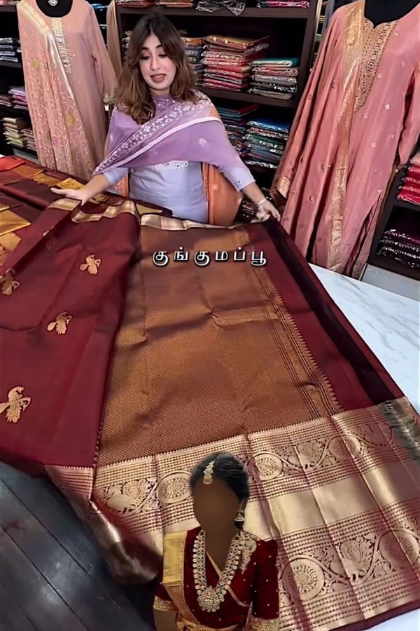 Maroon Banarasi Soft Silk Saree with Gold Zari Buttas and Wide Brocade Border  in Surat