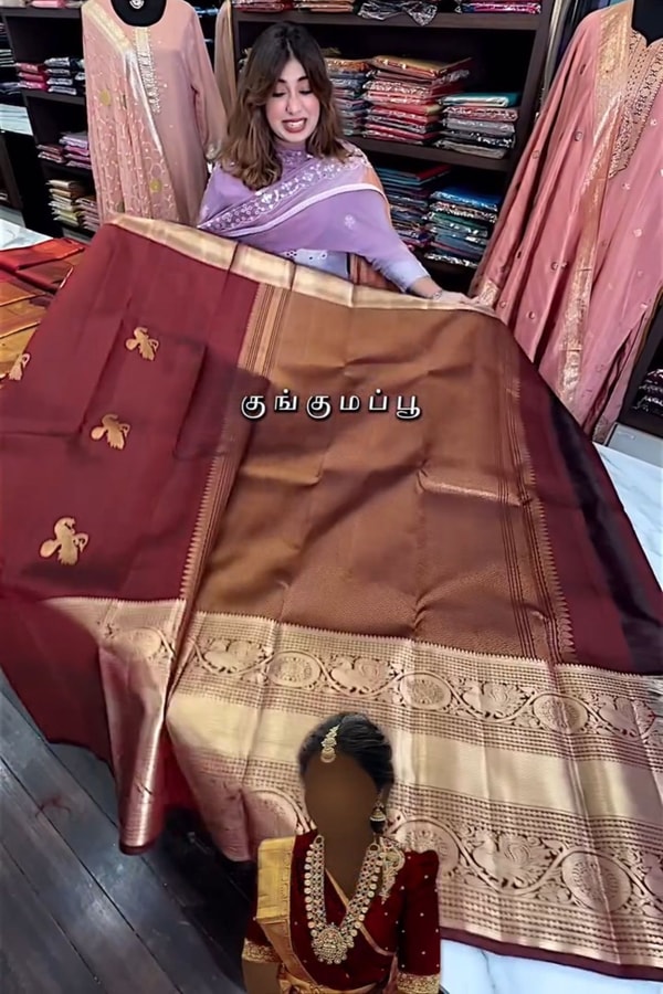 Maroon Banarasi Soft Silk Saree with Gold Zari Buttas and Wide Brocade Border  in Surat