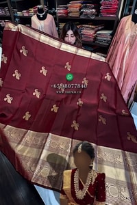 Maroon Banarasi Soft Silk Saree with Gold Zari Buttas and Wide Brocade Border  in Surat