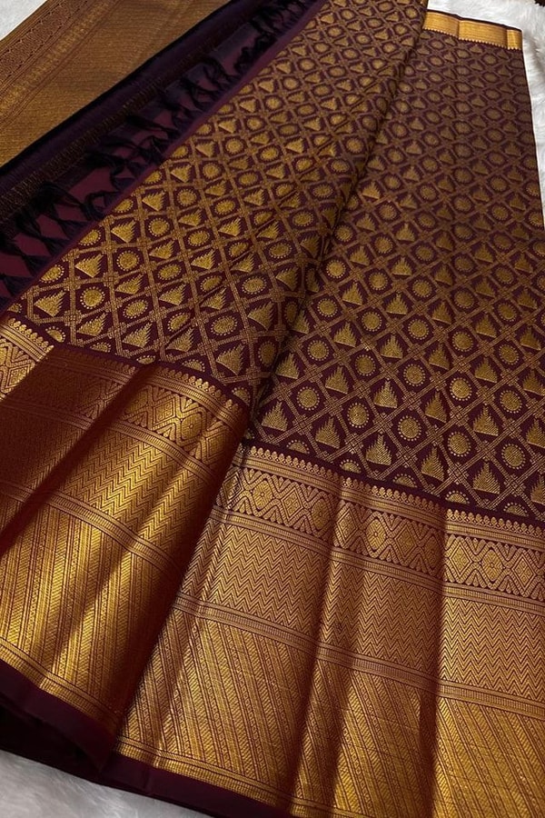 Maroon Banarasi Soft Silk Saree with Gold Zari Diamond Jaal and Heavy Temple-Style Border  in Surat