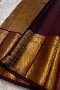 Maroon Banarasi Soft Silk Saree with Gold Zari Diamond Jaal and Heavy Temple-Style Border  in Surat