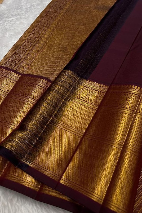 Maroon Banarasi Soft Silk Saree with Gold Zari Diamond Jaal and Heavy Temple-Style Border  in Surat