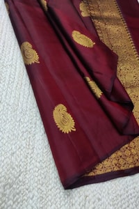 Maroon Banarasi Soft Silk Saree with Gold Zari Mango Buttas and Woven Gold Pallu  in Surat