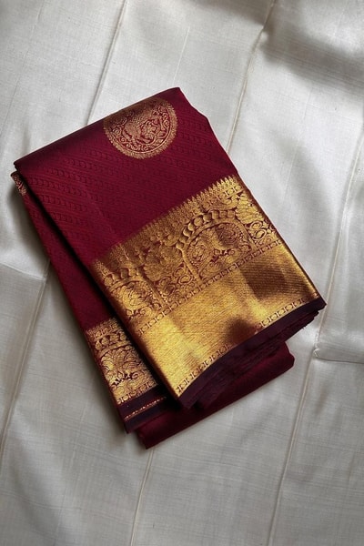 Maroon Banarasi Soft Silk Saree with Round Zari Medallion Buttas and Checked Gold Pallu in Surat
