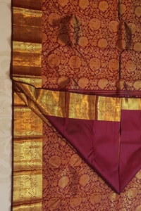 Maroon Bridal Banarasi Soft Silk Saree with All-Over Gold Zari Brocade and Heavy Border  in Surat