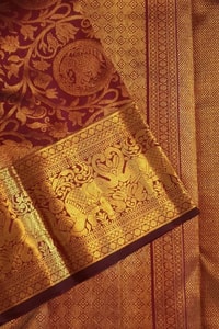 Maroon Bridal Banarasi Soft Silk Saree with All-Over Gold Zari Brocade and Heavy Border  in Surat