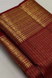 Maroon Red Banarasi Soft Silk Saree with Gold Zari Herringbone Weave and Multi-Band Border  in Surat