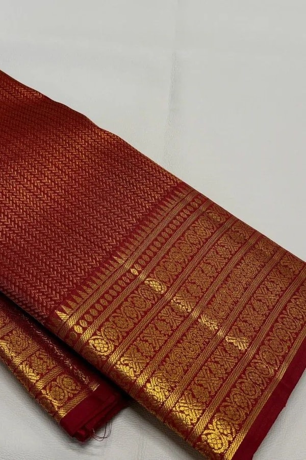 Maroon Red Banarasi Soft Silk Saree with Gold Zari Herringbone Weave and Multi-Band Border  in Surat
