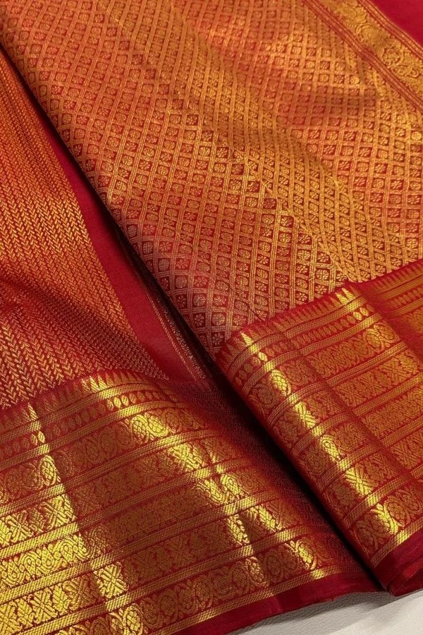 Maroon Red Banarasi Soft Silk Saree with Gold Zari Herringbone Weave and Multi-Band Border  in Surat