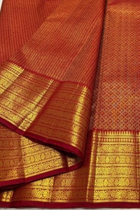 Maroon Red Banarasi Soft Silk Saree with Gold Zari Herringbone Weave and Multi-Band Border  in Surat