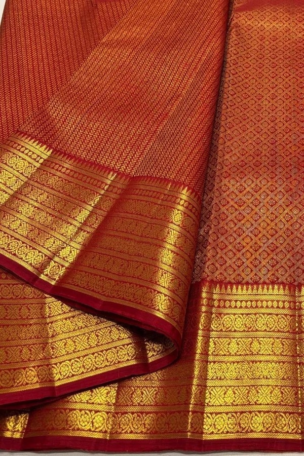 Maroon Red Banarasi Soft Silk Saree with Gold Zari Herringbone Weave and Multi-Band Border  in Surat