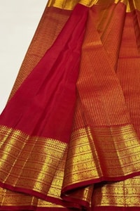 Maroon Red Banarasi Soft Silk Saree with Gold Zari Herringbone Weave and Multi-Band Border  in Surat