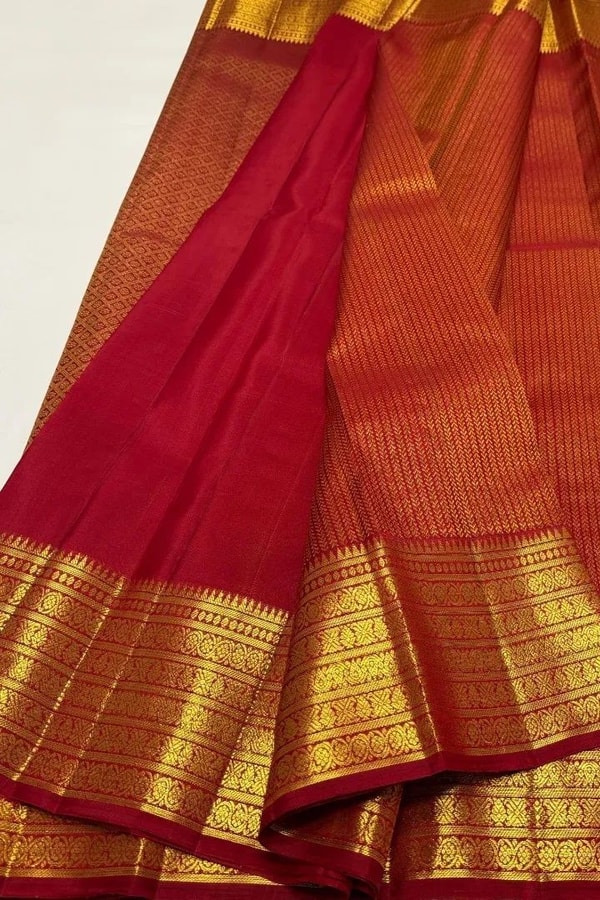 Maroon Red Banarasi Soft Silk Saree with Gold Zari Herringbone Weave and Multi-Band Border  in Surat