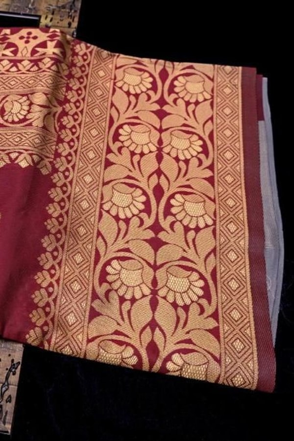 Maroon Zari Leaf Butta Banarasi Soft Silk Saree with Wide Brocade Border in Gold or Silver Zari  in Surat