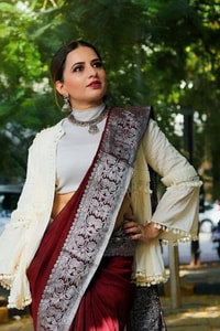 Maroon Zari Leaf Butta Banarasi Soft Silk Saree with Wide Brocade Border in Gold or Silver Zari  in Surat