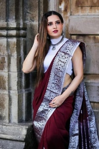Maroon Zari Leaf Butta Banarasi Soft Silk Saree with Wide Brocade Border in Gold or Silver Zari  in Surat