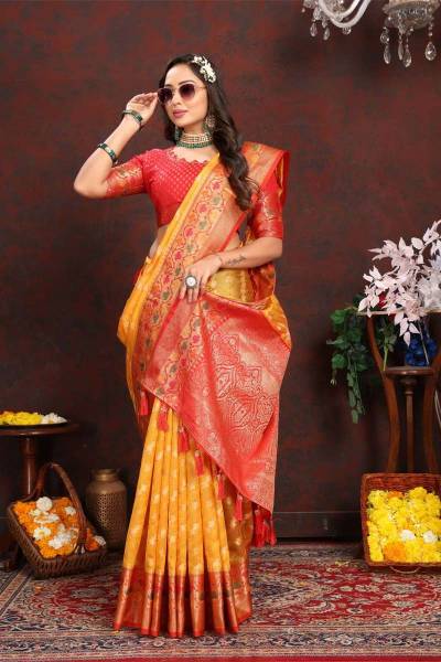 Meenakari Weaving Adorns Luxurious Organza Silk saree with fancy design in Surat