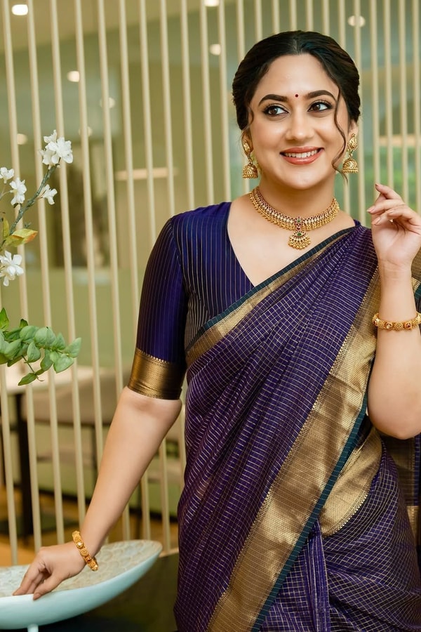 Midnight Indigo Banarasi Soft Silk Saree with Plain Body and Wide Gold Zari Border  in Surat