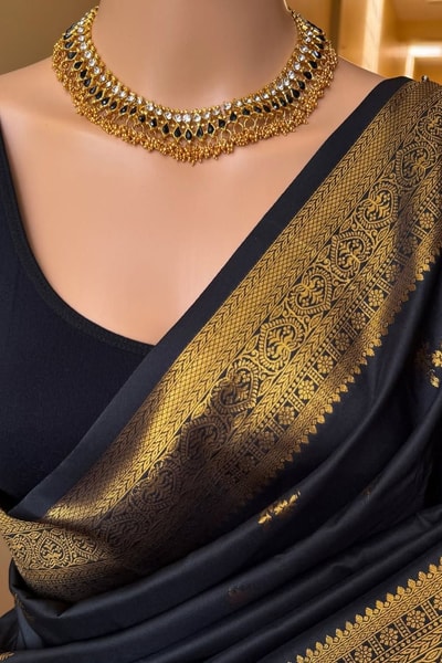 Minimal Gold Butti Banarasi Soft Silk Saree with Rich Zari Pallu in Black and Bottle Green in Surat