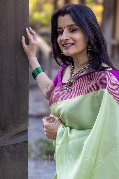 Mint Green Banarasi Soft Silk Saree with Contrast Magenta Zari Border and Striped Pallu in Surat
