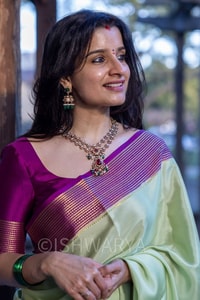Mint Green Banarasi Soft Silk Saree with Contrast Magenta Zari Border and Striped Pallu  in Surat