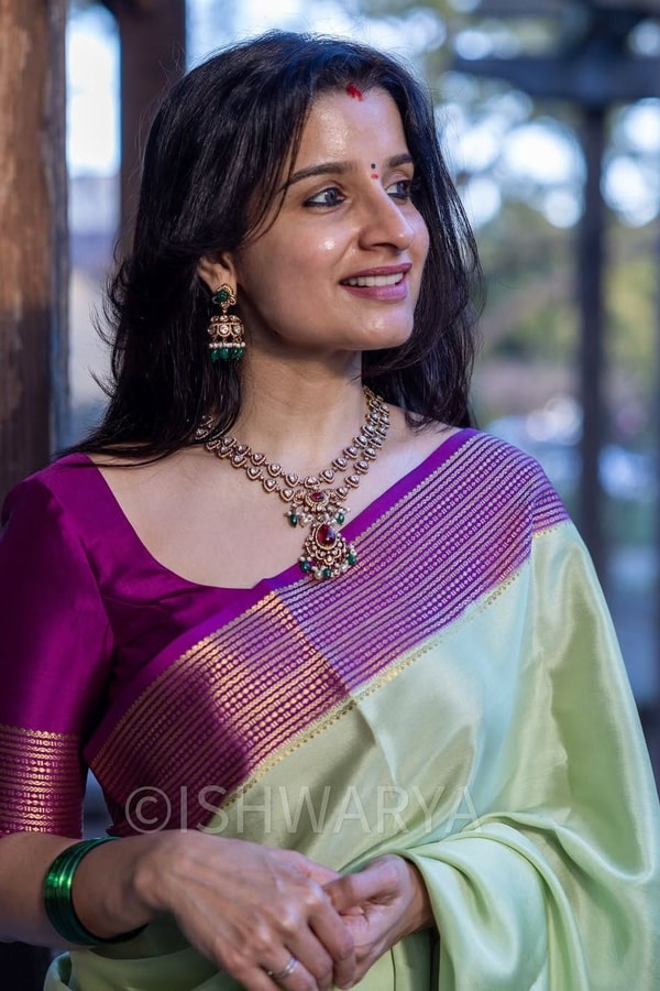 Mint Green Banarasi Soft Silk Saree with Contrast Magenta Zari Border and Striped Pallu  in Surat