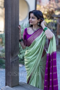 Mint Green Banarasi Soft Silk Saree with Contrast Magenta Zari Border and Striped Pallu  in Surat