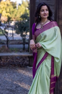 Mint Green Banarasi Soft Silk Saree with Contrast Magenta Zari Border and Striped Pallu  in Surat