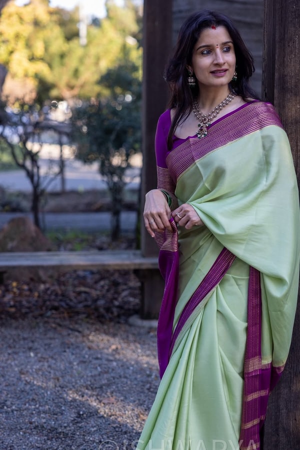 Mint Green Banarasi Soft Silk Saree with Contrast Magenta Zari Border and Striped Pallu  in Surat