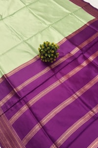 Mint Green Banarasi Soft Silk Saree with Contrast Magenta Zari Border and Striped Pallu  in Surat