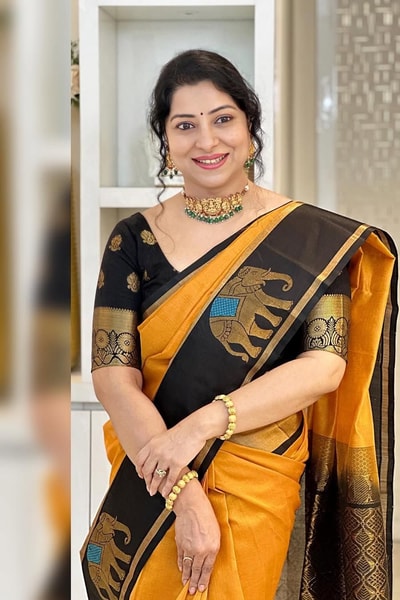 Mustard Orange Banarasi Soft Silk Saree with Contrast Black Elephant Motif Zari Border in Surat
