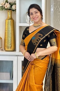Mustard Orange Banarasi Soft Silk Saree with Contrast Black Elephant Motif Zari Border  in Surat